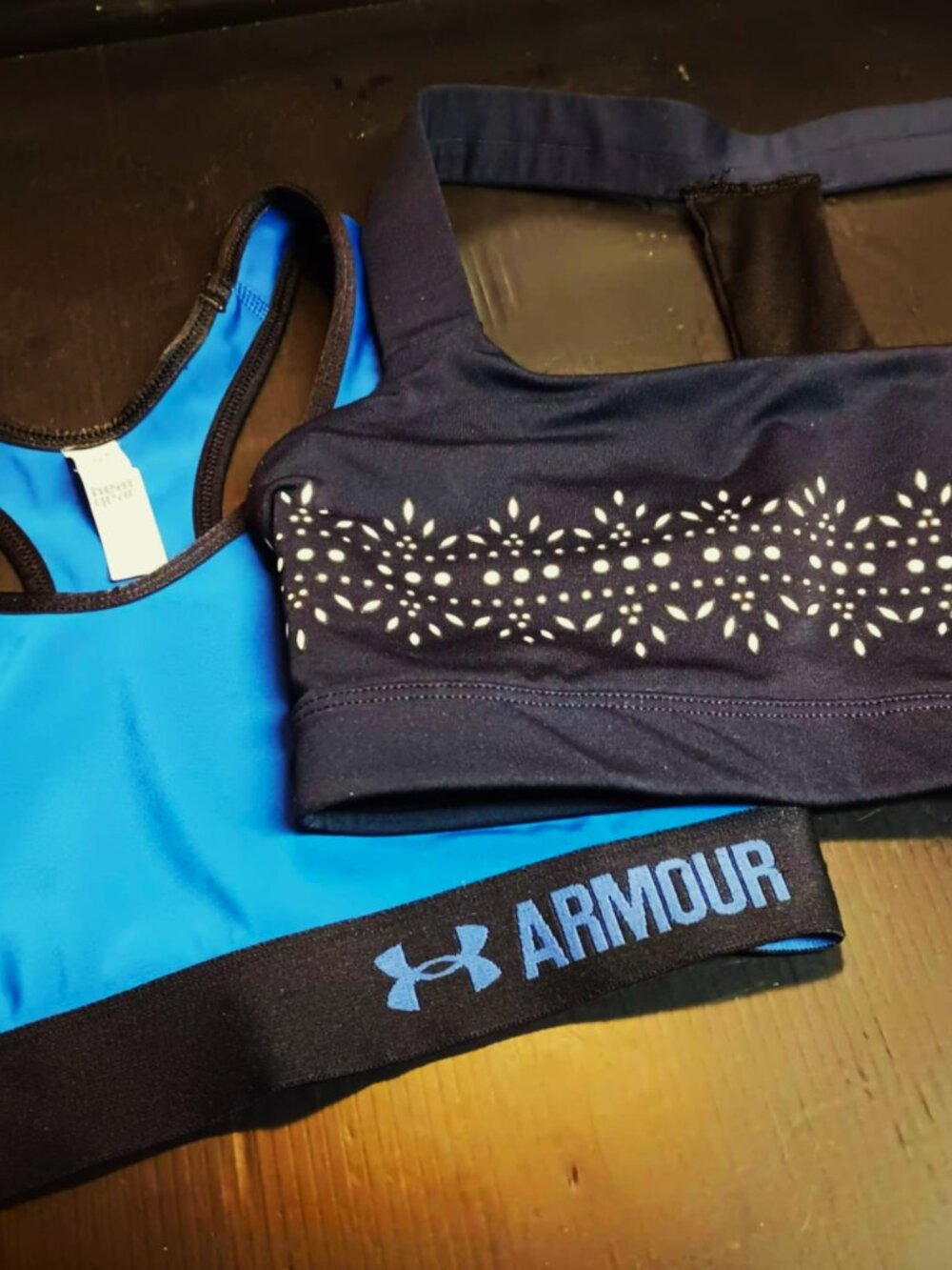 Lot of two size small medium impact sports bras, Under Armour and Gap Fit.